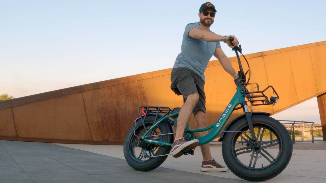 Person riding the ENGWE L20 Boost Electric Bike in a scenic outdoor setting.