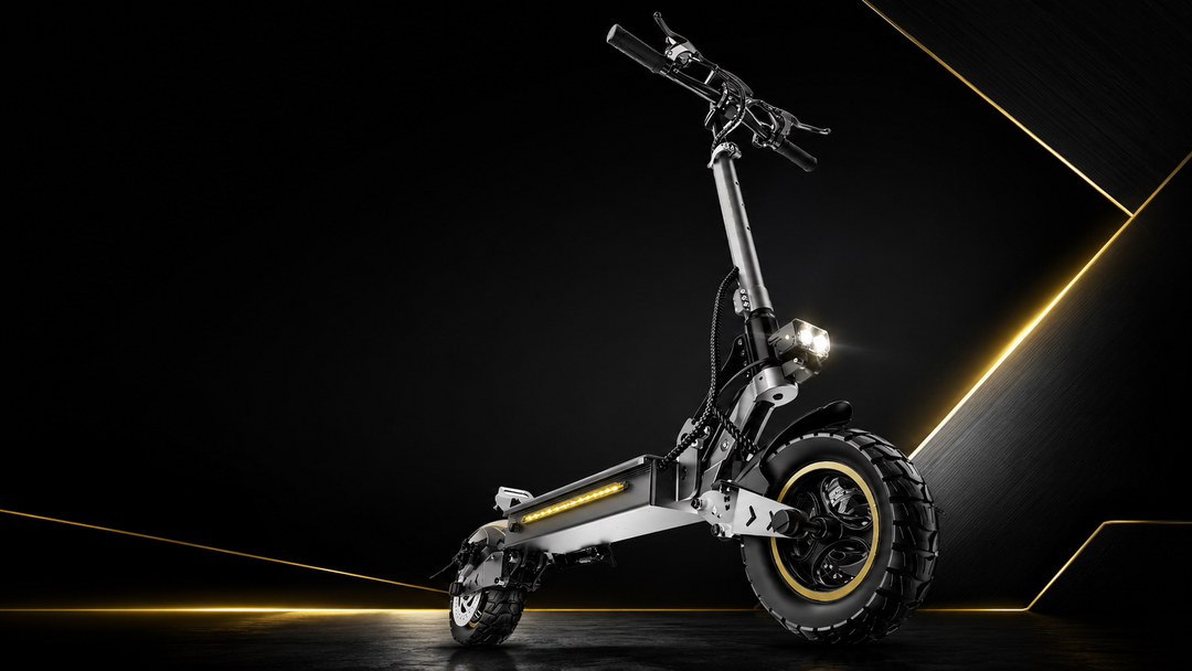 700W all-terrain electric scooter showcasing a sleek design with rugged tires and bright LED lights.