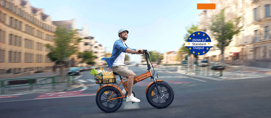 A man riding the ENGWE EP-2 Boost Electric Bike through a city with a basket filled with groceries.