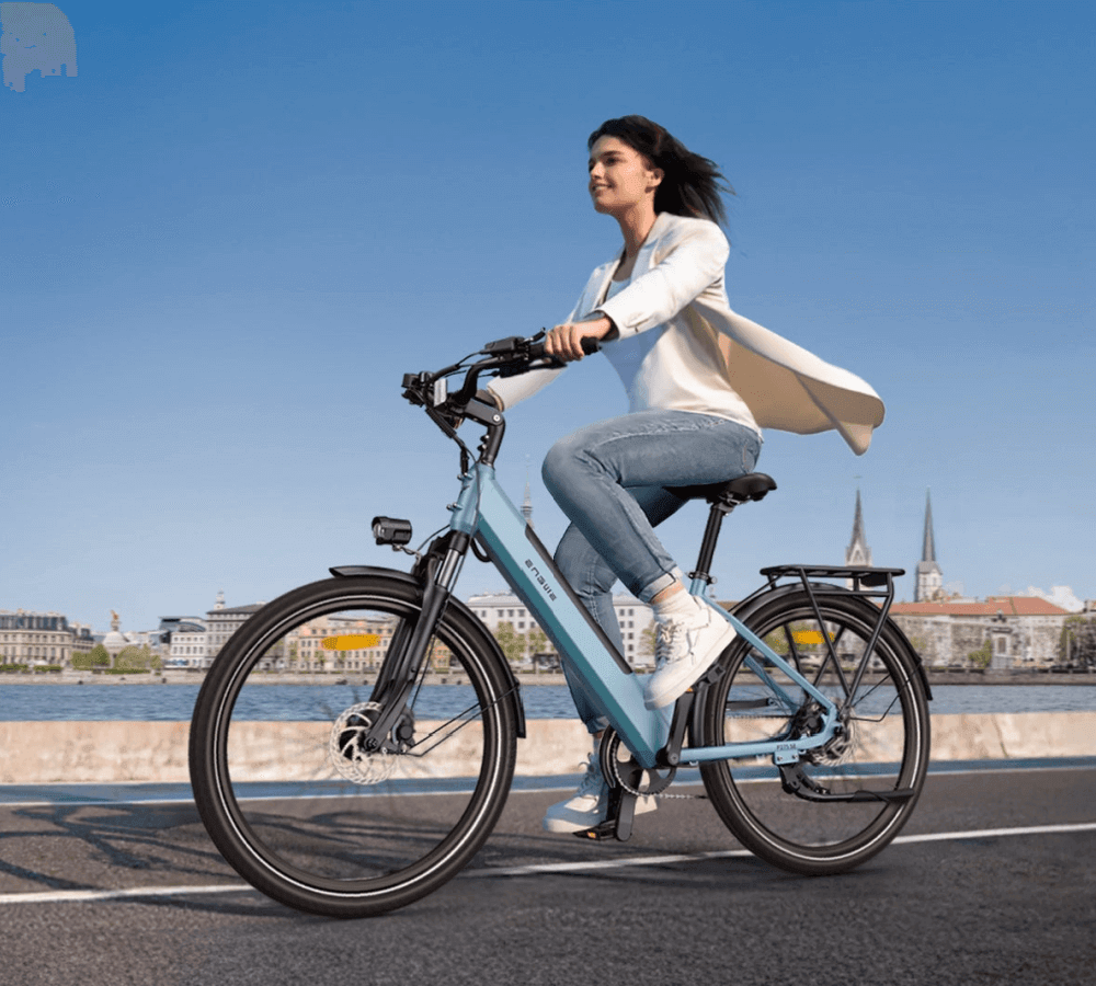 ENGWE P275 SE electric bike review showcasing a rider on a scenic city road.
