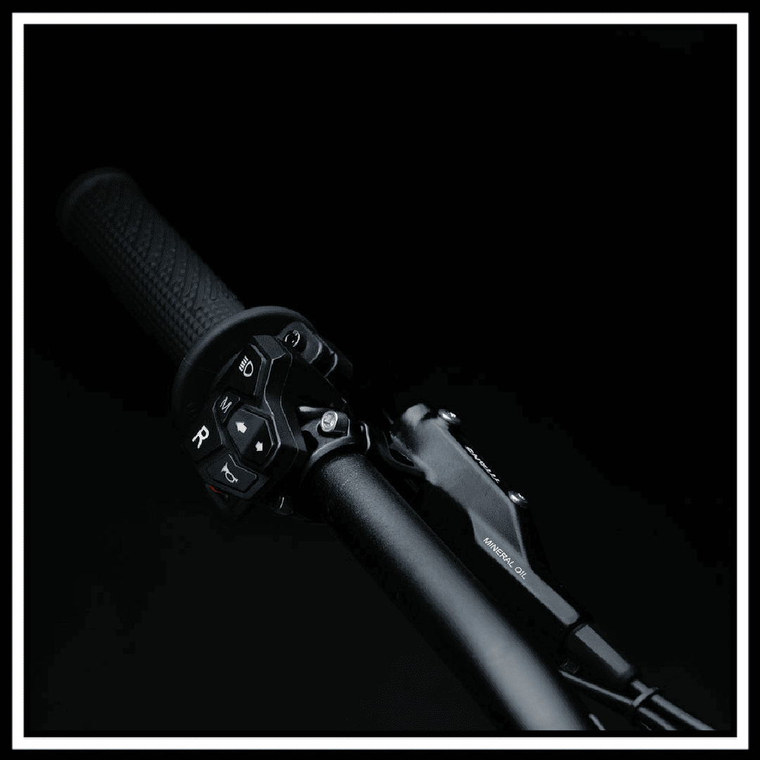 79BIKE-FALCON PRO OFF-ROAD ELECTRIC DIRT BIKE handlebar controls with throttle and brake features