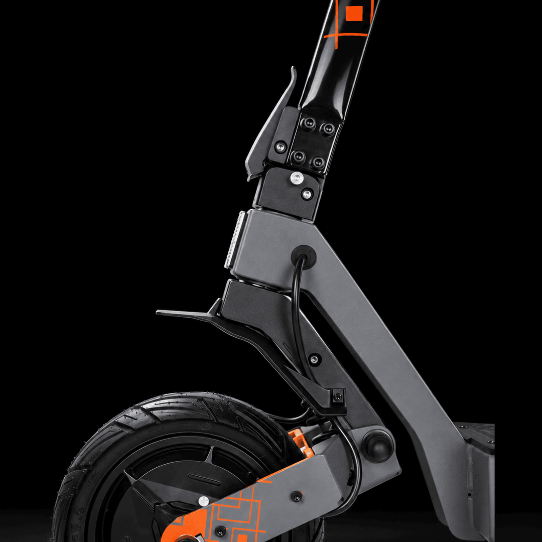 Kukirin G4 Ultra Electric Scooter - Close-up of a black and gray electric scooter showing the front wheel, suspension fork, and handlebar joint with orange accent details, set against a solid black background.