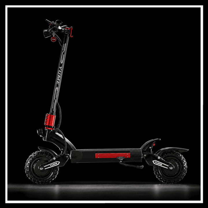 YUME Raptor 2 electric scooter displayed against a black background showcasing its sleek design and off-road tires.
