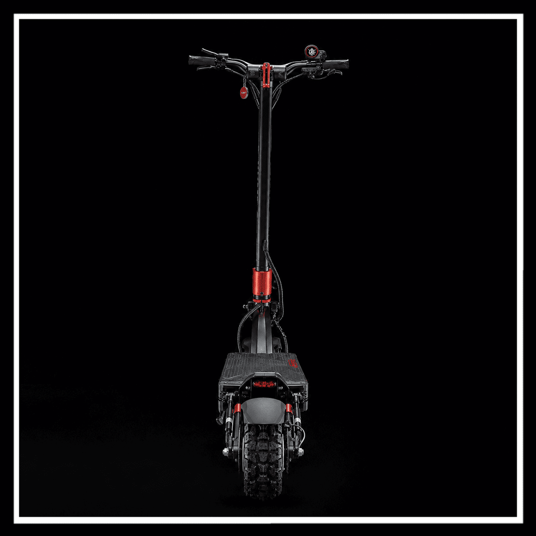YUME Raptor 2 electric scooter rear view against a dark background, showcasing its sleek design and durable tires.