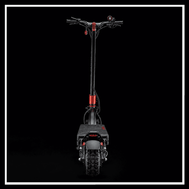 YUME Raptor 2 electric scooter rear view against a dark background, showcasing its sleek design and durable tires.