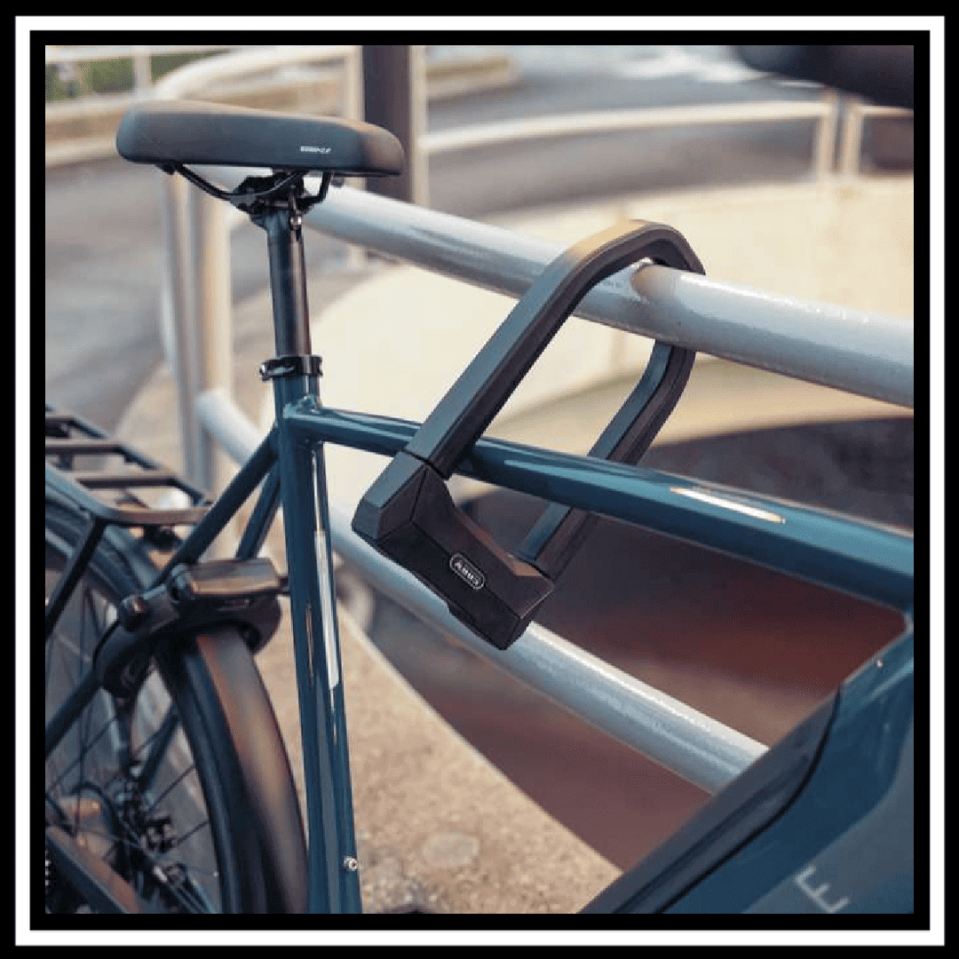 ABUS GRANIT SUPER EXTREME 2500 lock secured on a bicycle frame to ensure safety and protection against theft.