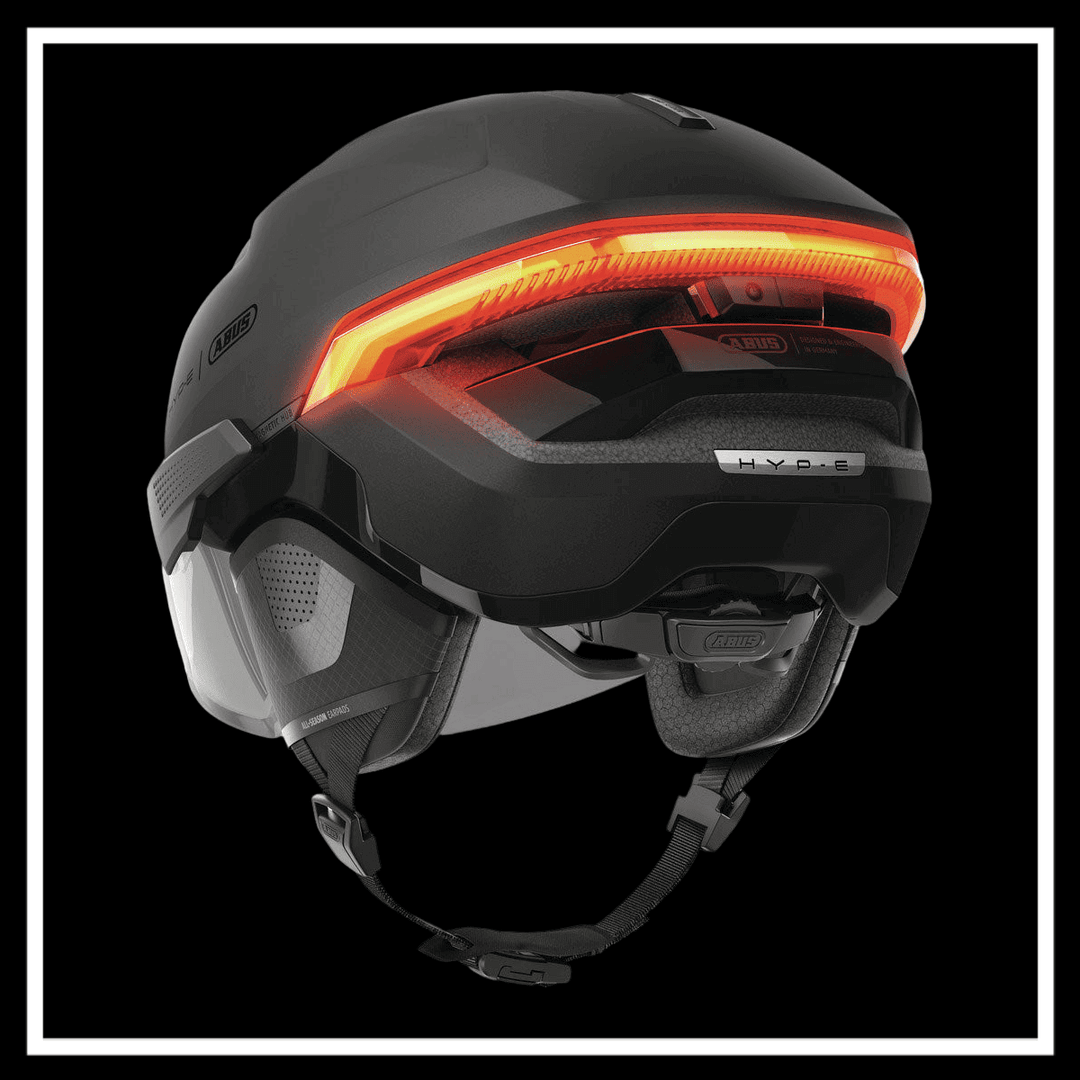 ABUS HYP-E ACE BICYCLE HELMET ELECTRIC BIKE with a sleek design and integrated rear light for safety.