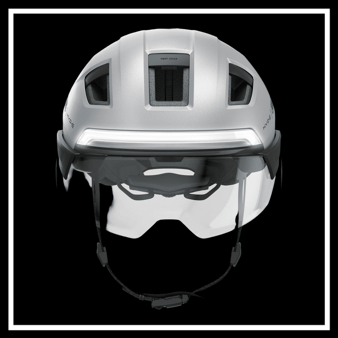 ABUS HYP-E ACE BICYCLE HELMET ELECTRIC BIKE showcased in silver color, viewed from the front, highlighting visor and ventilation features.