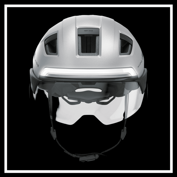 ABUS HYP-E ACE BICYCLE HELMET ELECTRIC BIKE showcased in silver color, viewed from the front, highlighting visor and ventilation features.