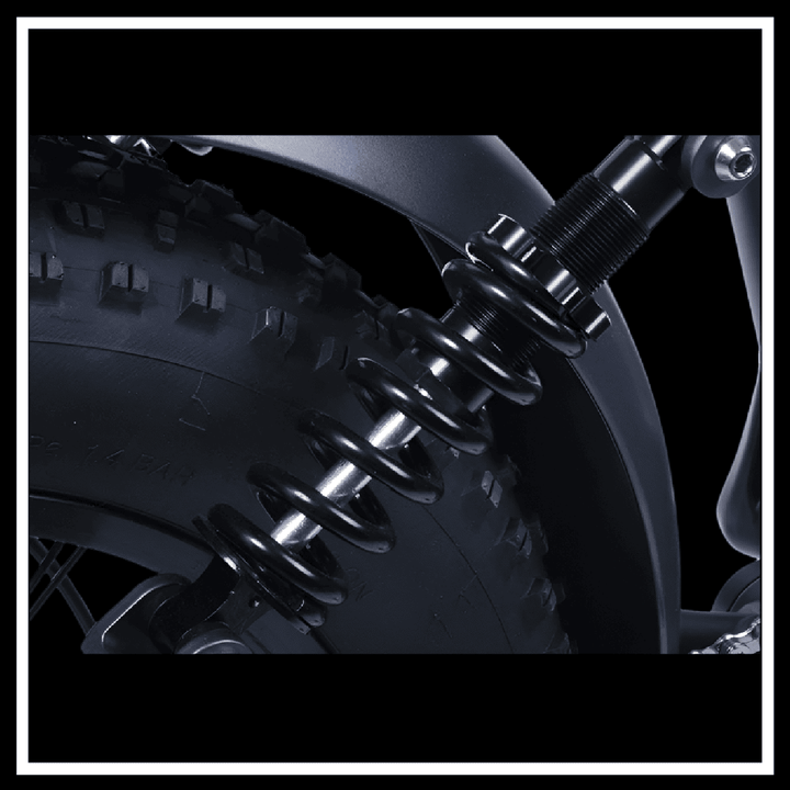 Close-up of the rear suspension and tire of the BEZIOR XF006 ELECTRIC BIKE showcasing its robust design.