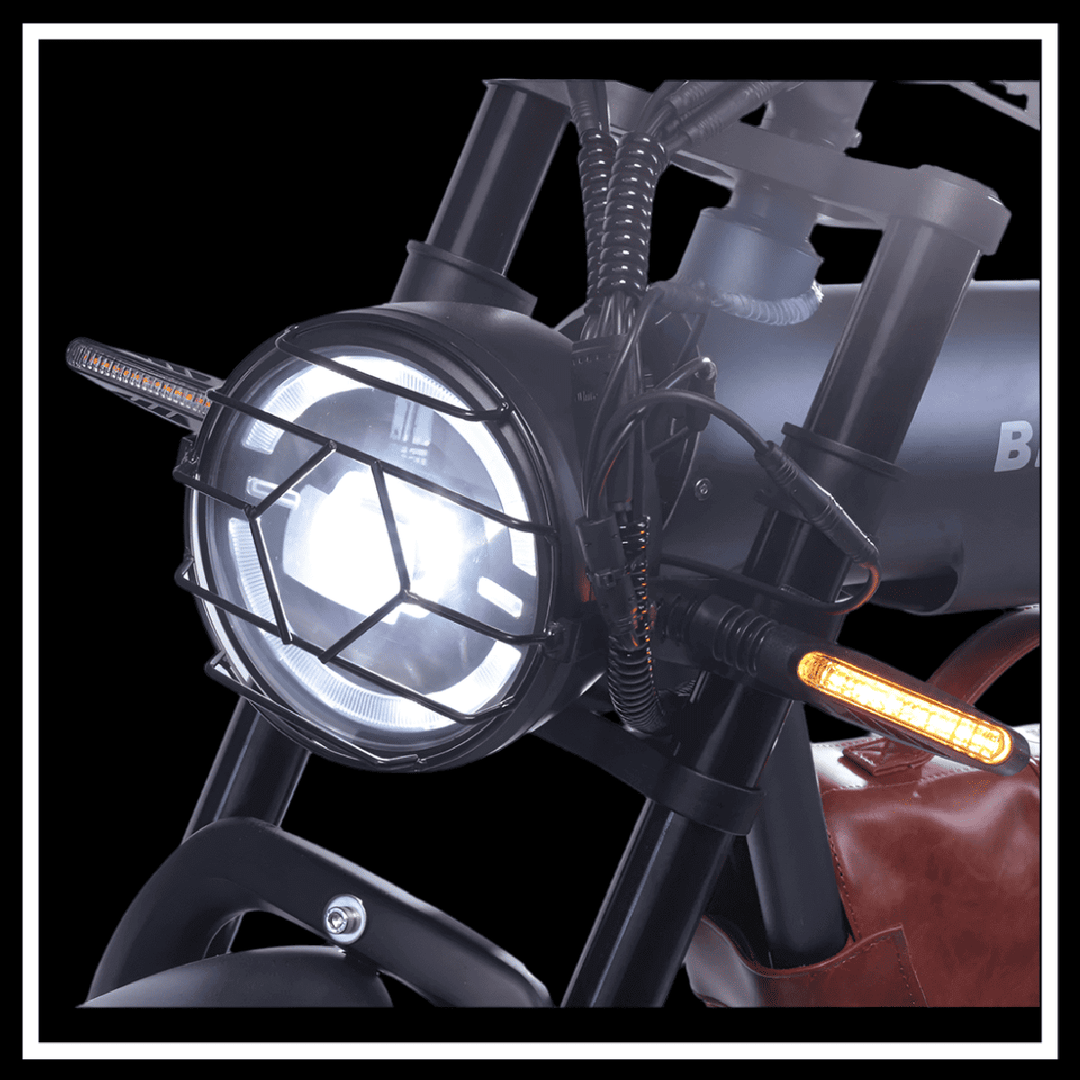 Headlight and turn signals of the 🇮🇪🇪🇺 BEZIOR XF006 electric mountain bike showing advanced design and visibility.