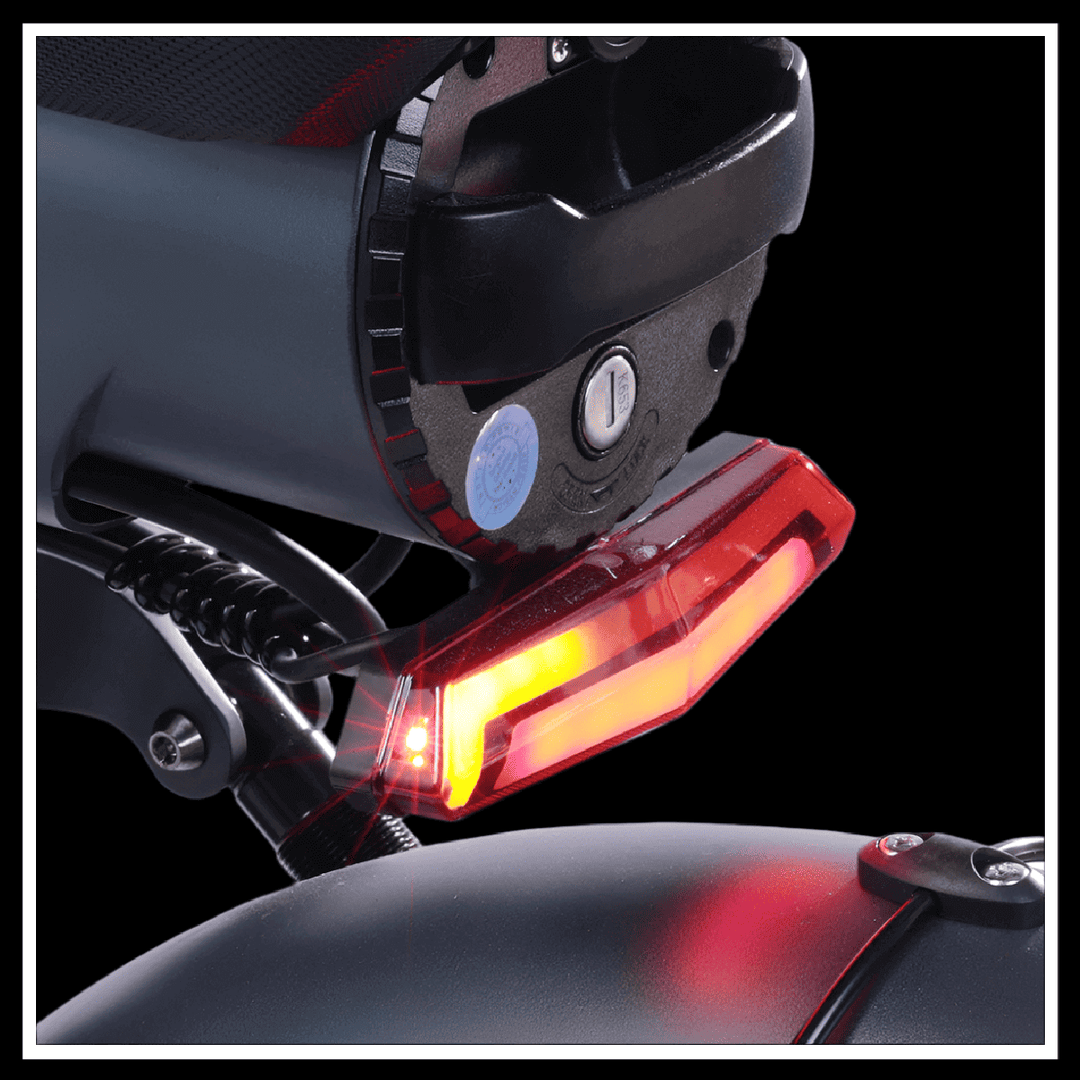 BEZIOR XF006 rear light demonstrating safety features for electric mountain bike adventure.