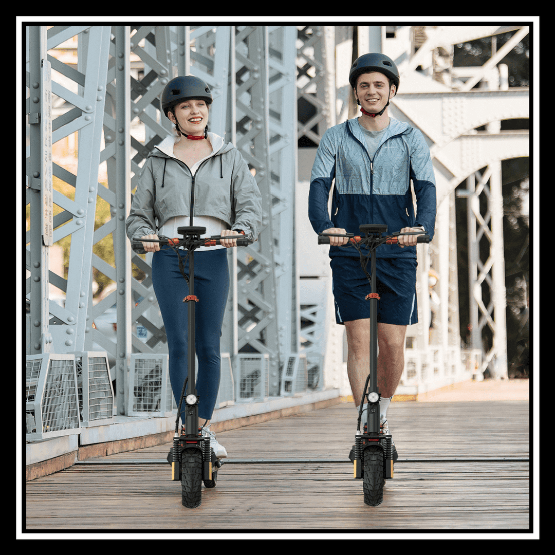 Two people riding electric scooters on a bridge, showcasing the performance of the 🇮🇪🇪🇺🇬🇧🇺🇸 iENYRID M4 PRO S+.
