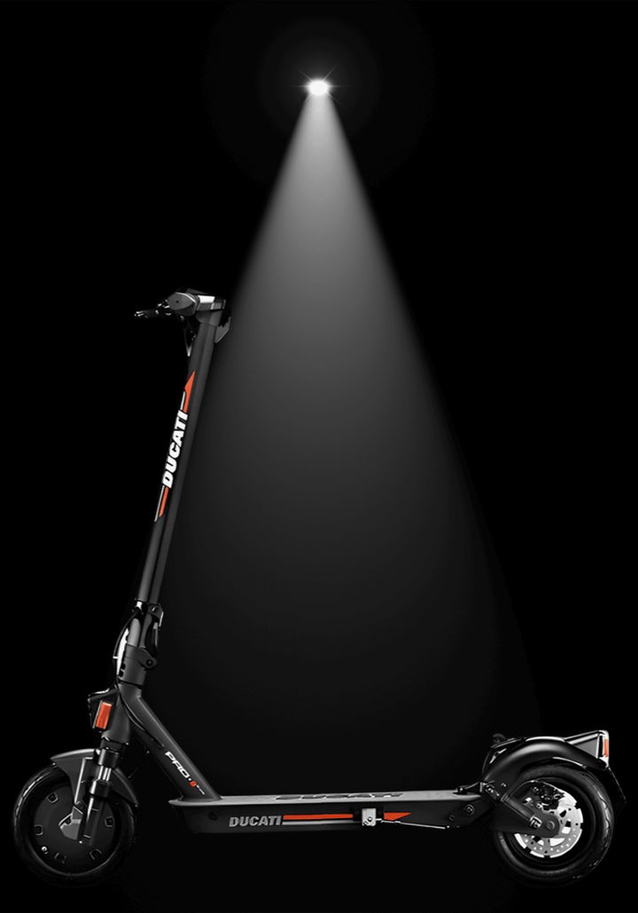 🇮🇪 DUCATI PRO II EVO electric scooter with sleek design and powerful performance under spotlight.