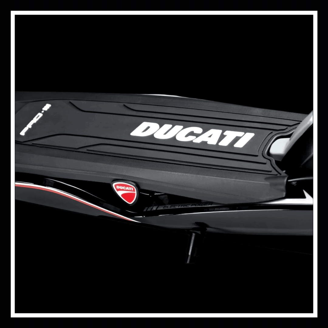 DUCATI PRO III electric scooter close-up view of the deck showcasing branding and design details.
