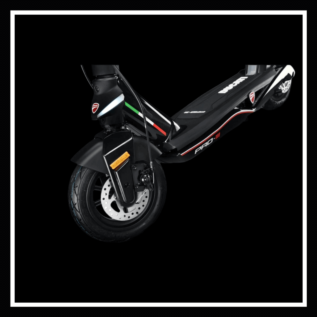 🇮🇪 DUCATI PRO III electric scooter front wheel and braking system, showcasing its sleek design and performance features.