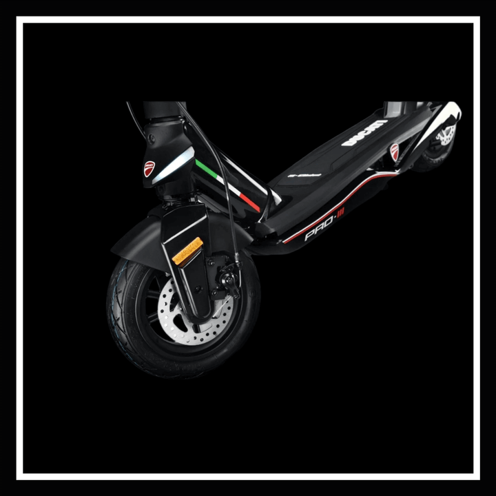 🇮🇪 DUCATI PRO III electric scooter front wheel and braking system, showcasing its sleek design and performance features.