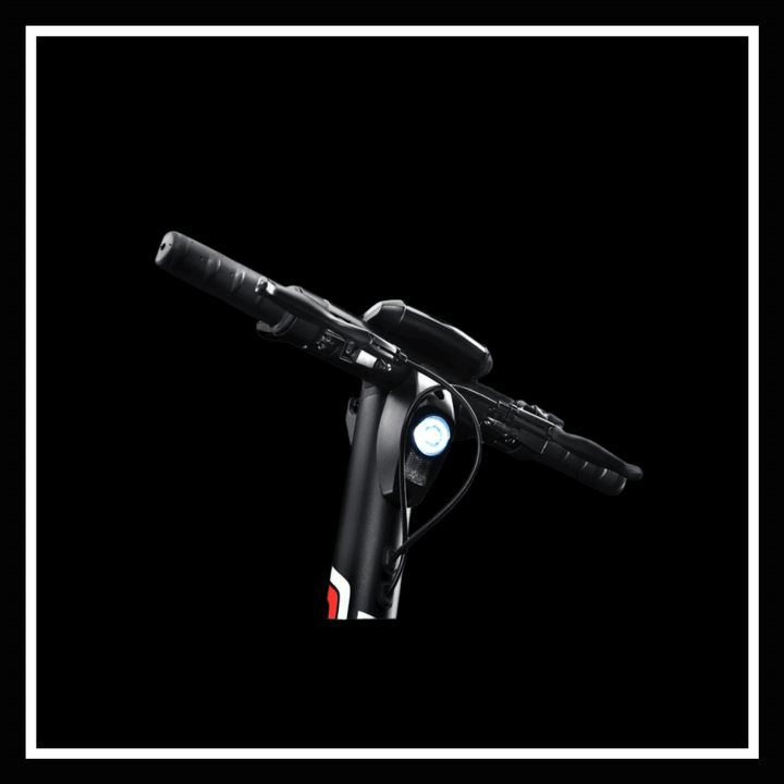 Handlebars of the 🇮🇪 DUCATI PRO III electric scooter showcasing the controls and light.