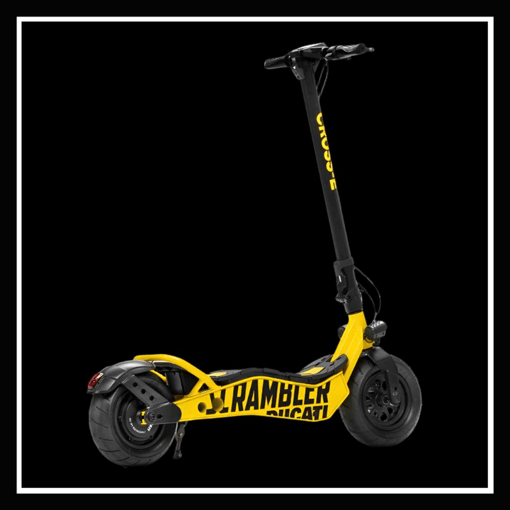 DUCATI SCRAMBLER E-Cross scooter in yellow with a modern design, showcasing its sporty features and premium branding.