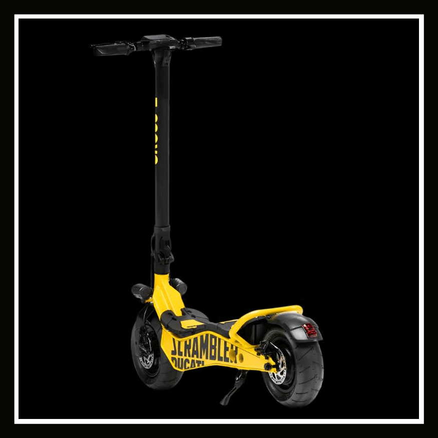 Ducati Scrambler E-Cross scooter featuring a sleek design in yellow color against a black background.