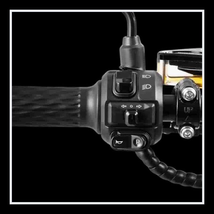 Close-up of EAHORA CHROME 4000W electric chopper motorcycle handlebar controls and switches.