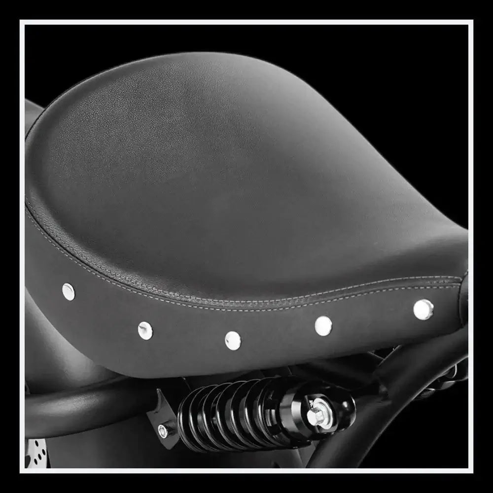 EAHORA KNIGHT M1PS electric chopper motorcycle seat with rivets and suspension detail.