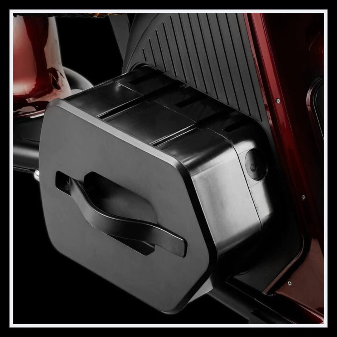 Close-up of the battery compartment of the EAHORA M8S electric motorcycle showcasing its sleek design.