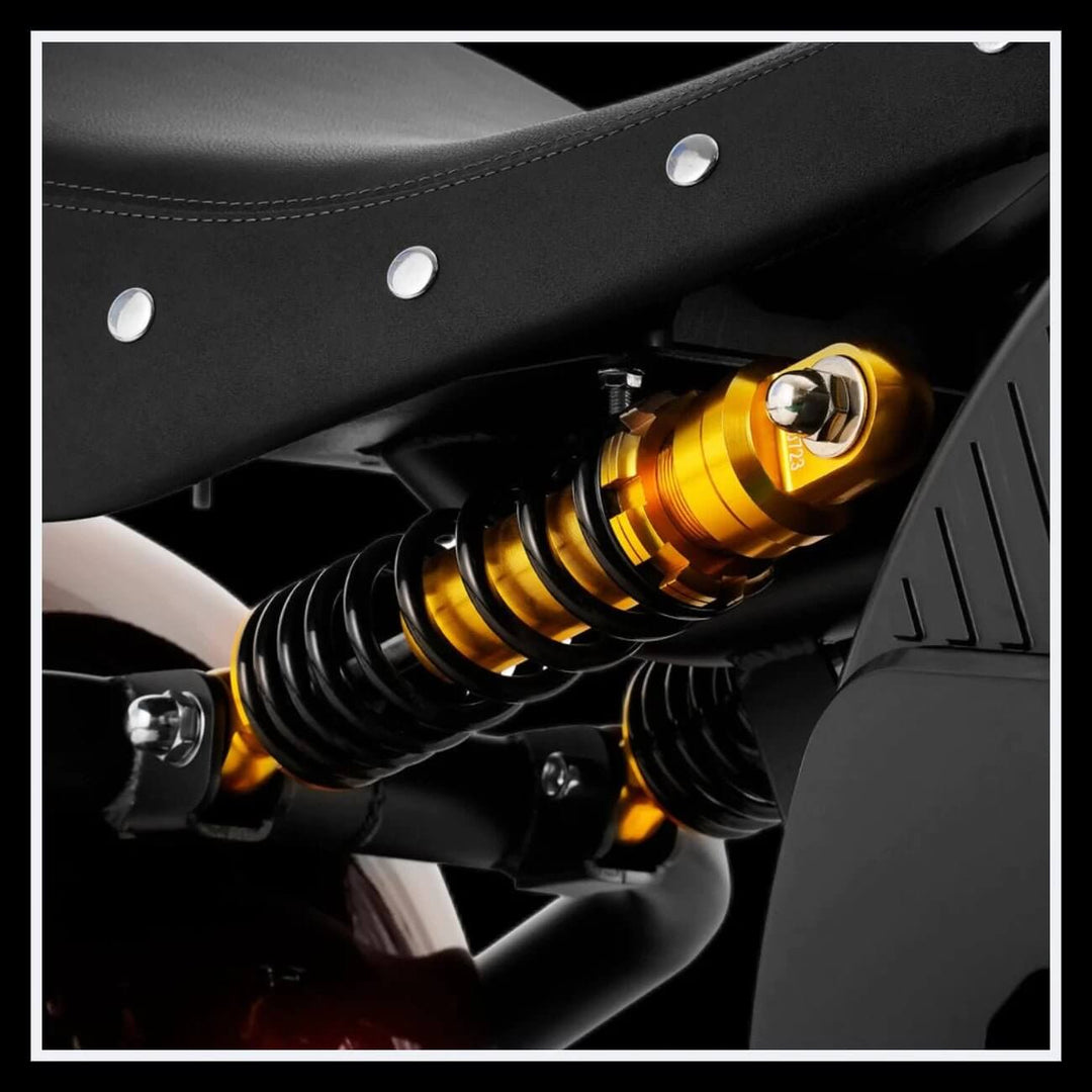 Close-up of the shock absorber of the EAHORA M8S electric motorcycle showing its sleek design.