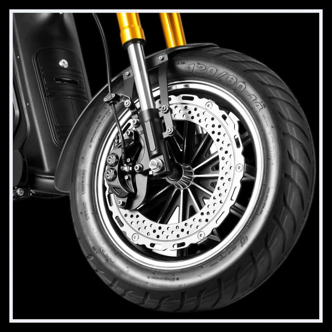 Front wheel of EAHORA M8S electric motorcycle with disc brake and stylish tire design.