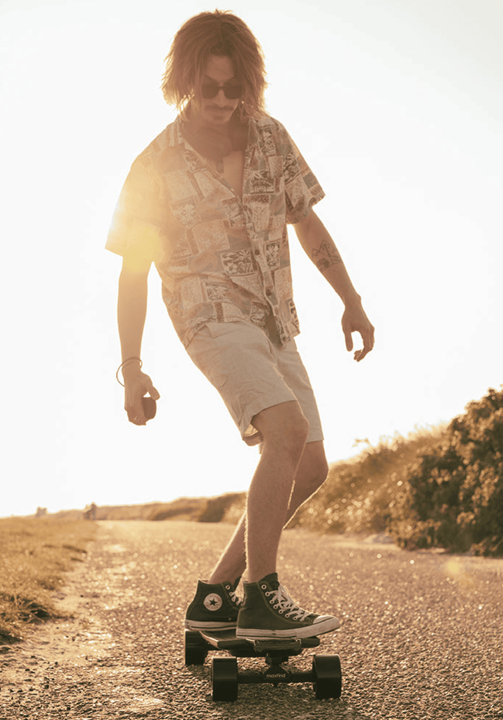 Skater enjoying a sunset ride on the MAXFIND FF PRO electric skateboard.