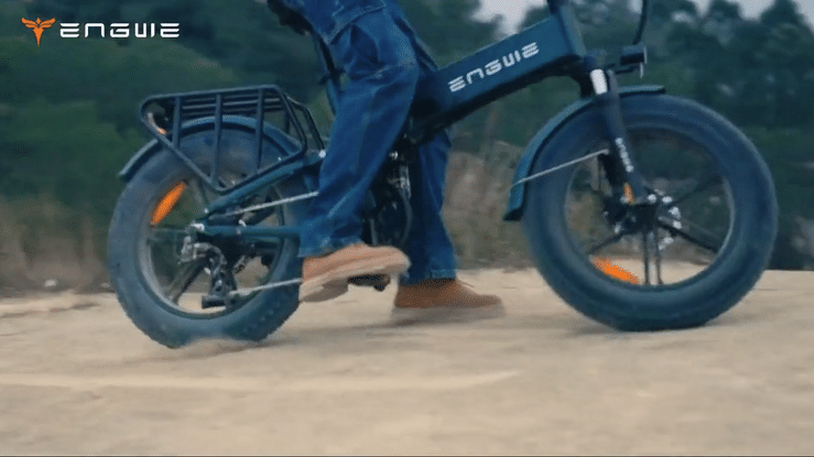 Engwe Engine Pro 2.0 electric bike in action, showcasing its foldable design and powerful performance.