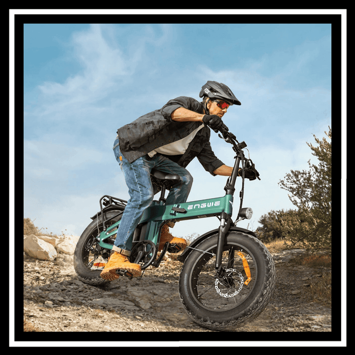 rider navigating rocky terrain on 🇮🇪🇬🇧🇪🇺 ENGWE EP-2 3.0 BOOST e-bike, showcasing its power and design.