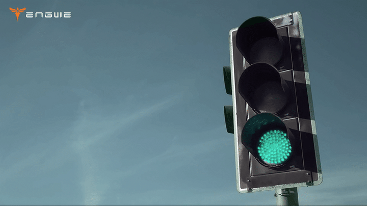 ENGWE L20 BOOST green traffic light signaling safe passage for electric bike riders.