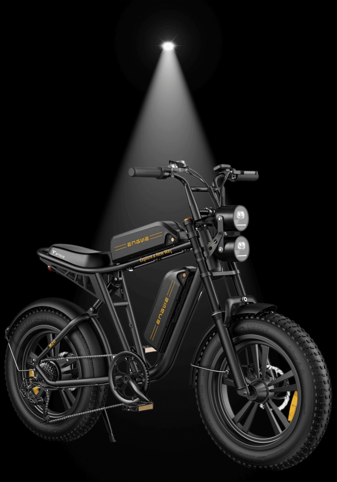 Engwe M20 electric bike showcased under spotlight, highlighting its sleek design and fat tires.