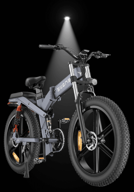 Engwe X26 electric bike showcased under spotlight with sleek design and fat tires, highlighting all-terrain capabilities.