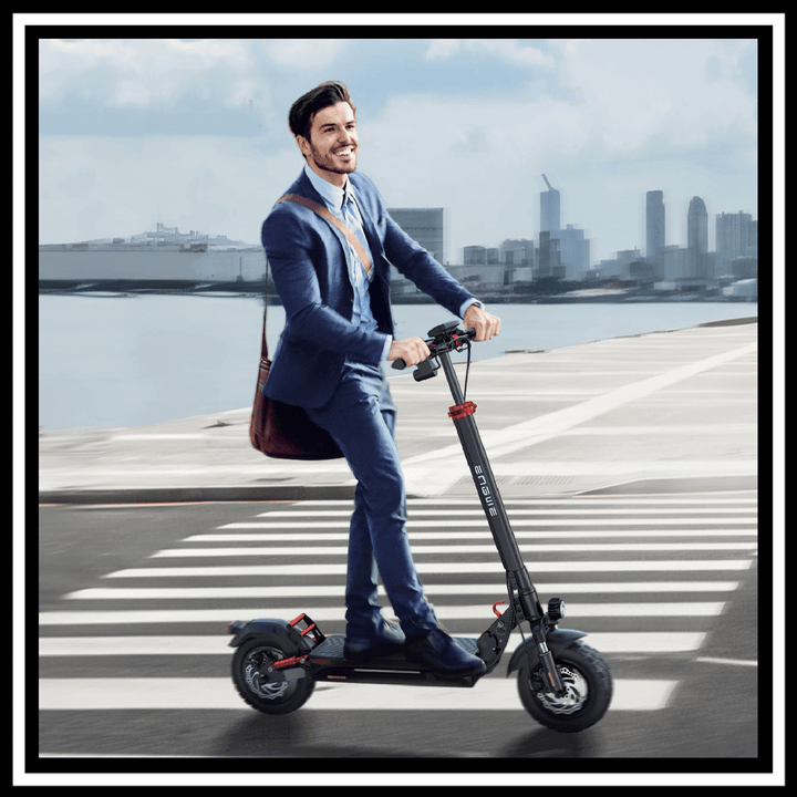 Man in a suit riding the 🇮🇪🇬🇧🇪🇺 ENGWE Y600 S electric scooter on an urban street.