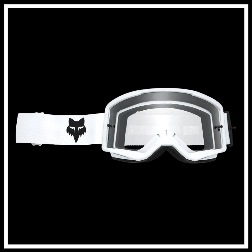 FOX RACING MAIN CORE GOGGLE with adjustable strap and clear lens on a black background.