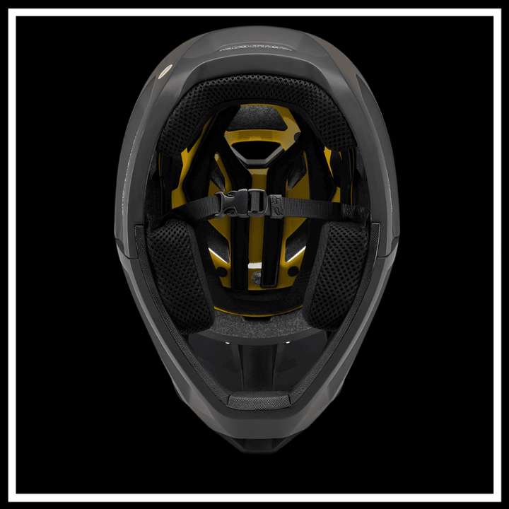 Inside view of a black and yellow FOX RACING PROFRAME SURFACE HELMET BIKE showcasing the interior padding and straps.