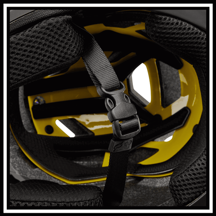 Interior view of FOX RACING PROFRAME SURFACE HELMET BIKE showcasing adjustable strap and padding for comfort.