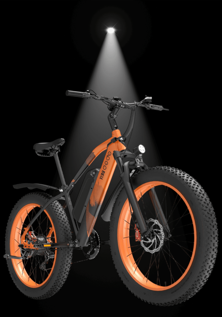 🇮🇪🇪🇺 GOGOBEST GF600 PLUS 1000W showcased under spotlight with bold orange detailing and rugged tires.