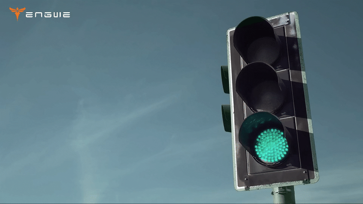 Green traffic light signaling go as a symbol of safe riding for ENGWE L20 Boost electric bike.