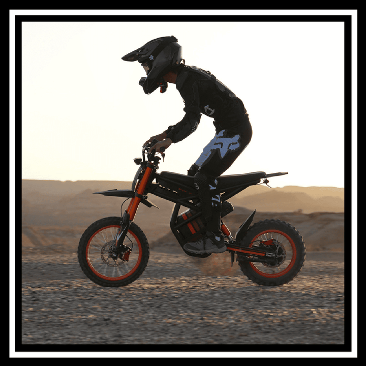 🇮🇪🇪🇺🇺🇸 GT54 2000W RIDING'TIMES ELECTRIC MINI E-BIKE in action on rugged terrain.