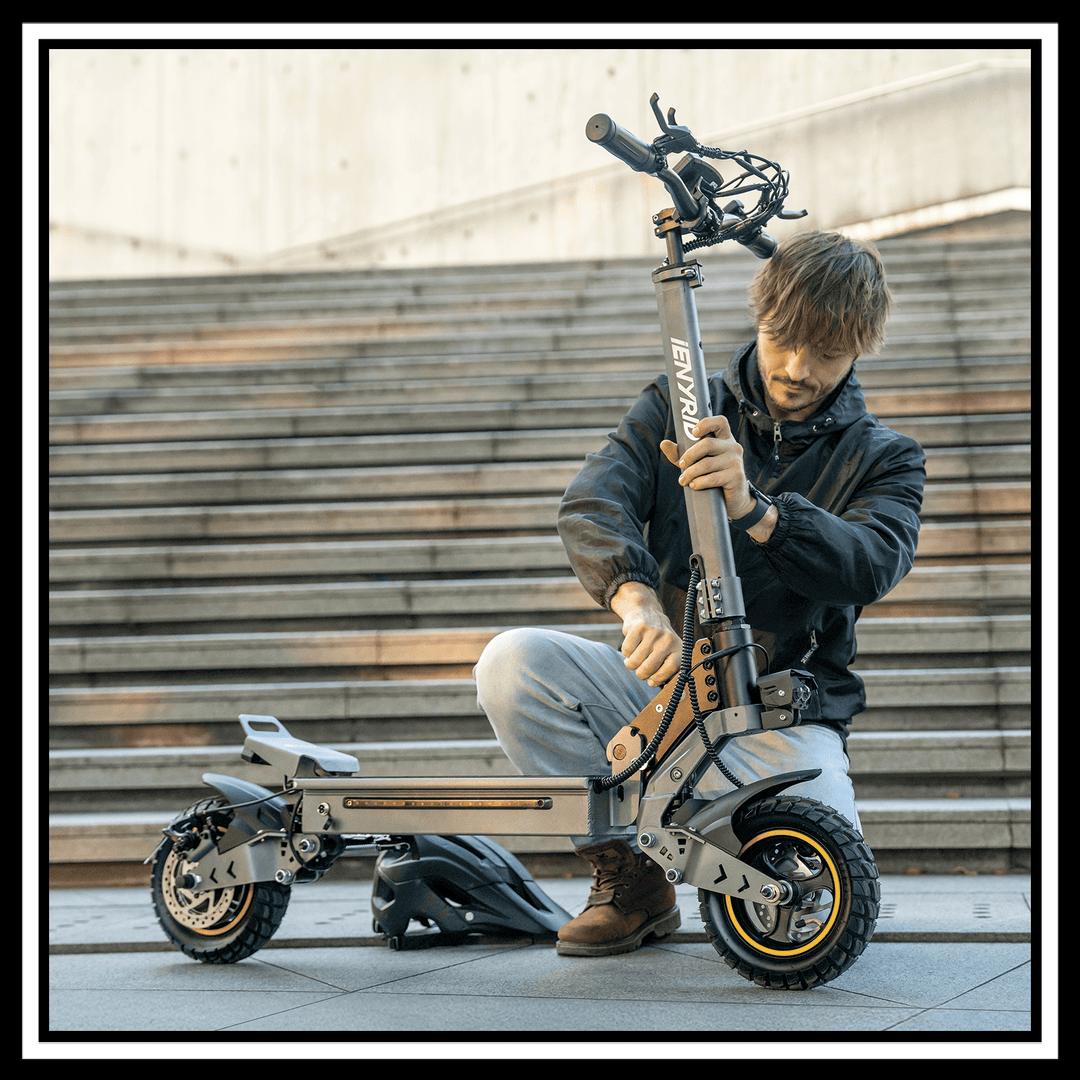 Man adjusting the 🇮🇪🇪🇺🇬🇧🇺🇸 iENYRID S1 electric scooter on urban steps, showcasing its design and features.