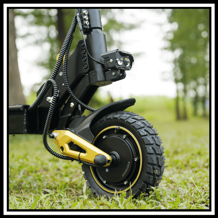 Close-up of iENYRID ES1 electric scooter wheel and motor showcasing its robust design and off-road capabilities.