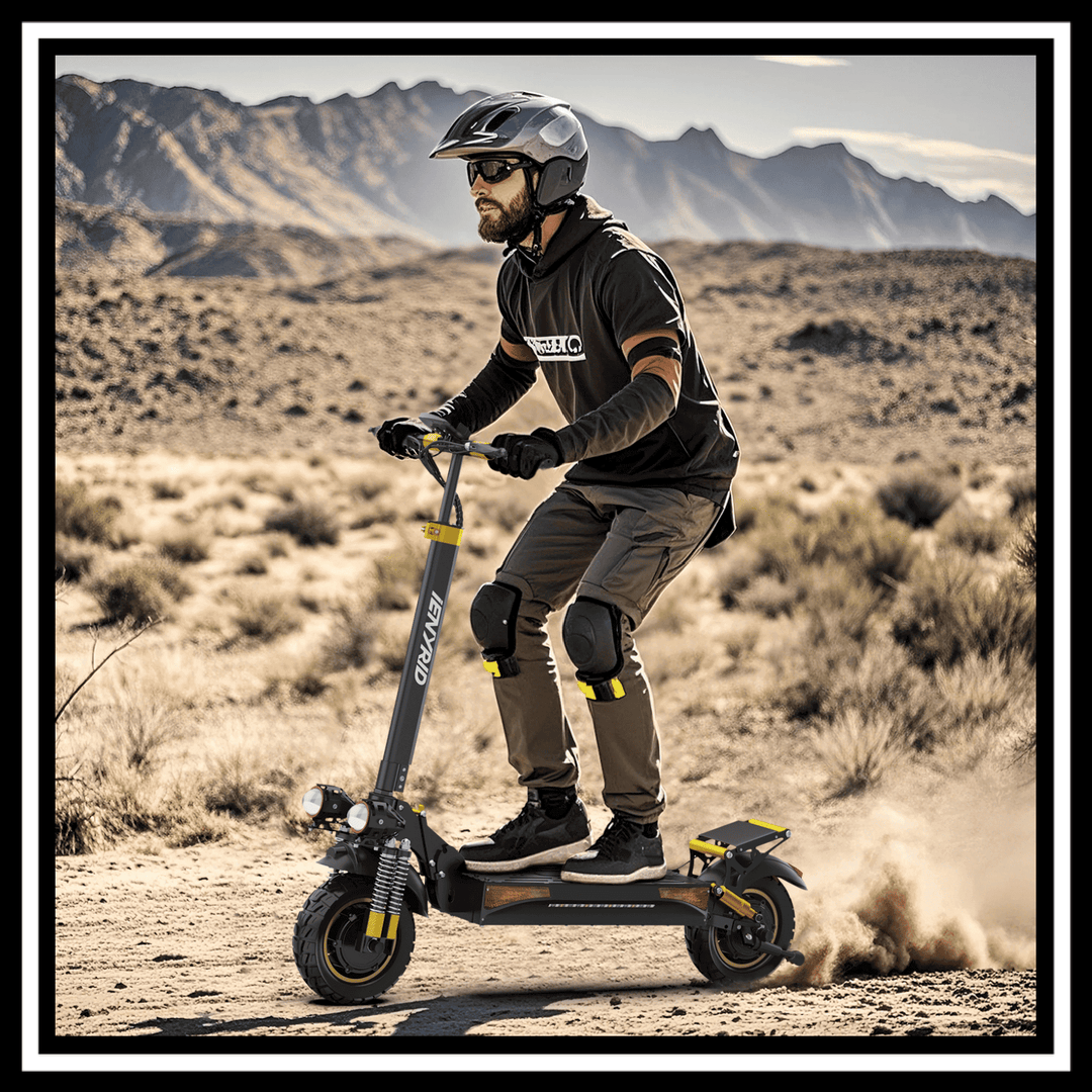 🇮🇪🇪🇺 iENYRID ES6 electric scooter being used off-road by a rider in protective gear on a desert path.