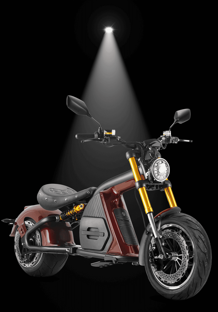 INTHEZONE M8S electric motorcycle showcased with spotlight illumination on a sleek design.