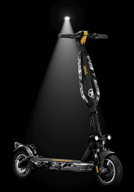 JEEP 2xe electric scooter showcasing its sleek design and durable frame with a spotlight effect.