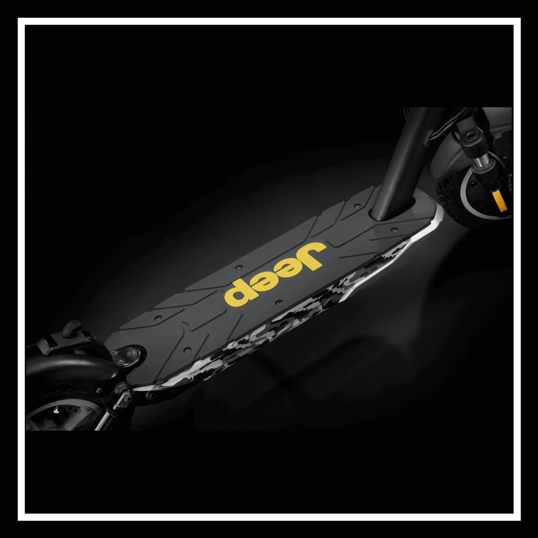 JEEP 2xe electric scooter footboard with yellow logo and rugged design in black