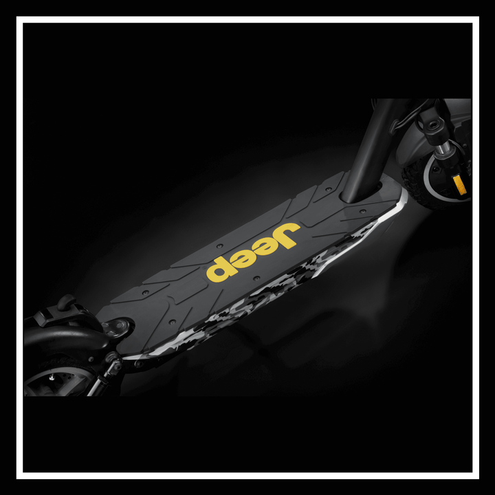 JEEP 2xe electric scooter footboard with yellow logo and rugged design in black