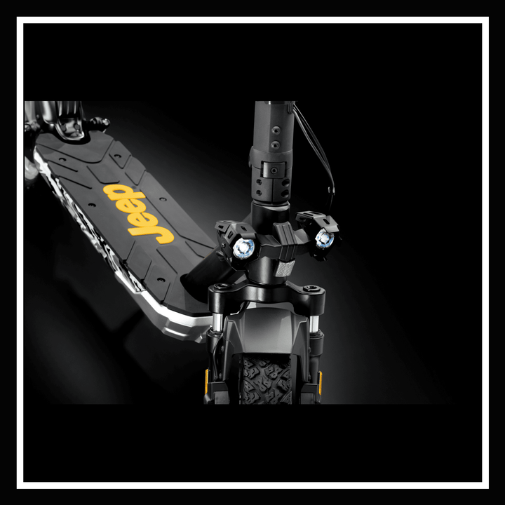 JEEP 2xe URBAN CAMOU electric scooter front view with durable magnesium alloy frame and LED lights